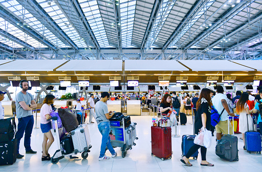 Passenger waiting check in Suvarnabhumi airport, Bangkok